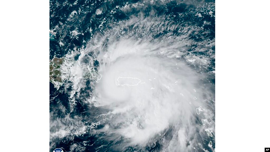 This satellite image provided by the US National Oceanic and Atmospheric Administration (NOAA) shows Hurricane Fiona on Sunday, September 18, 2022, in the Caribbean.