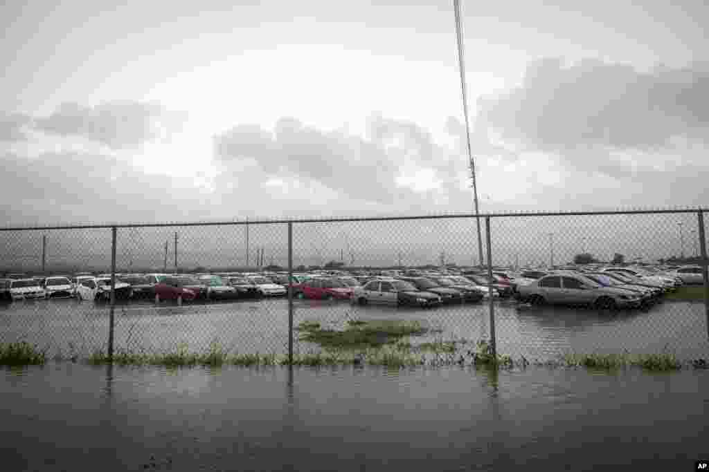A parking lot is flooded due to Hurricane Fiona in Salinas, Puerto Rico, Sept. 19, 2022. 