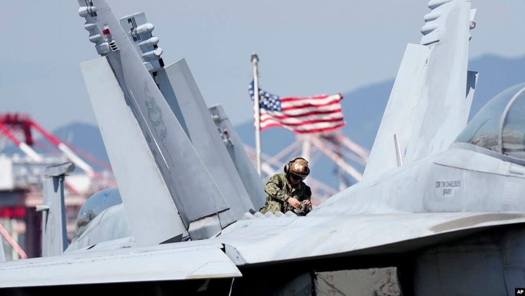 AQShning yadro qurollari bilan johozlangan "USS Ronald Reagan" avianosetsidagi "F/A-18 Hornet" qiruvchi samolyoti, 2022-yil, 23-sentabr