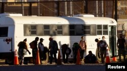 FILE - Migrants, mostly from Venezuela, requesting asylum in El Paso, Texas, as seen from Ciudad Juarez, Mexico, Sept. 23, 2022