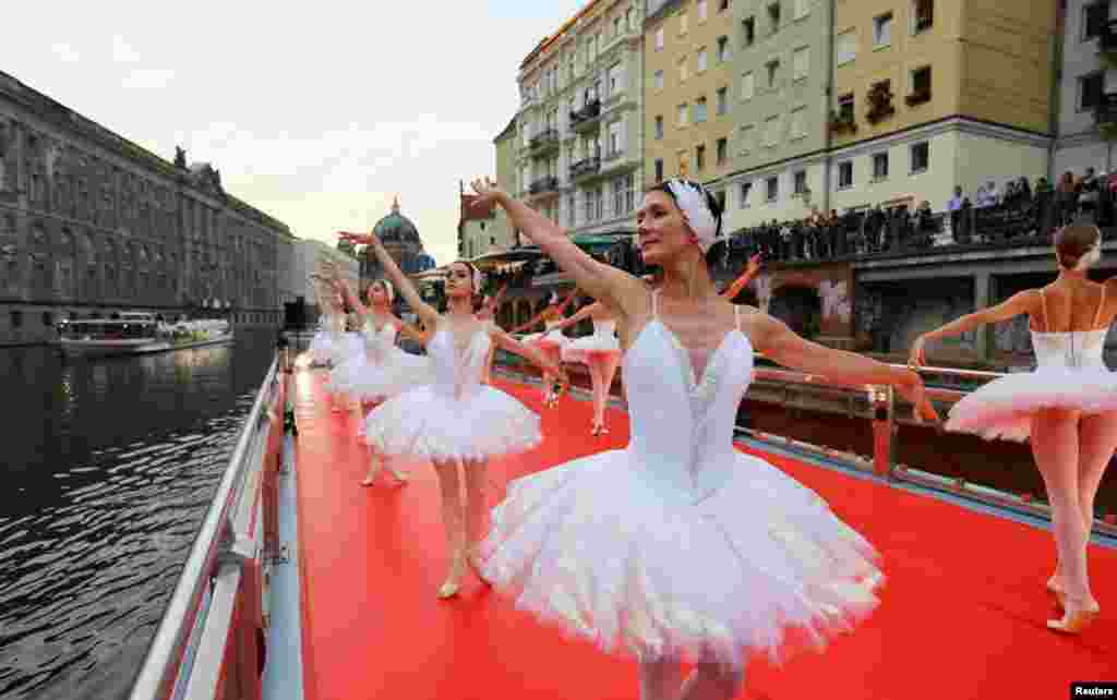Dancers from the State Ballet Berlin (Staatsballett Berlin) ensemble perform their program &quot;From Berlin with Love&quot; on the deck of a ship touring Berlin&#39;s landmarks, at Spree River, German, Sept. 12, 2022.