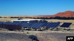 FILE - This solar electicity hybrid system is situated at the Gobabeb desert research station in the Namib Desert, Namibia. The nation has high hopes for green hydrogen production, but a proposal that involves the Tsau Khaeb National Park concerns environmentalists.