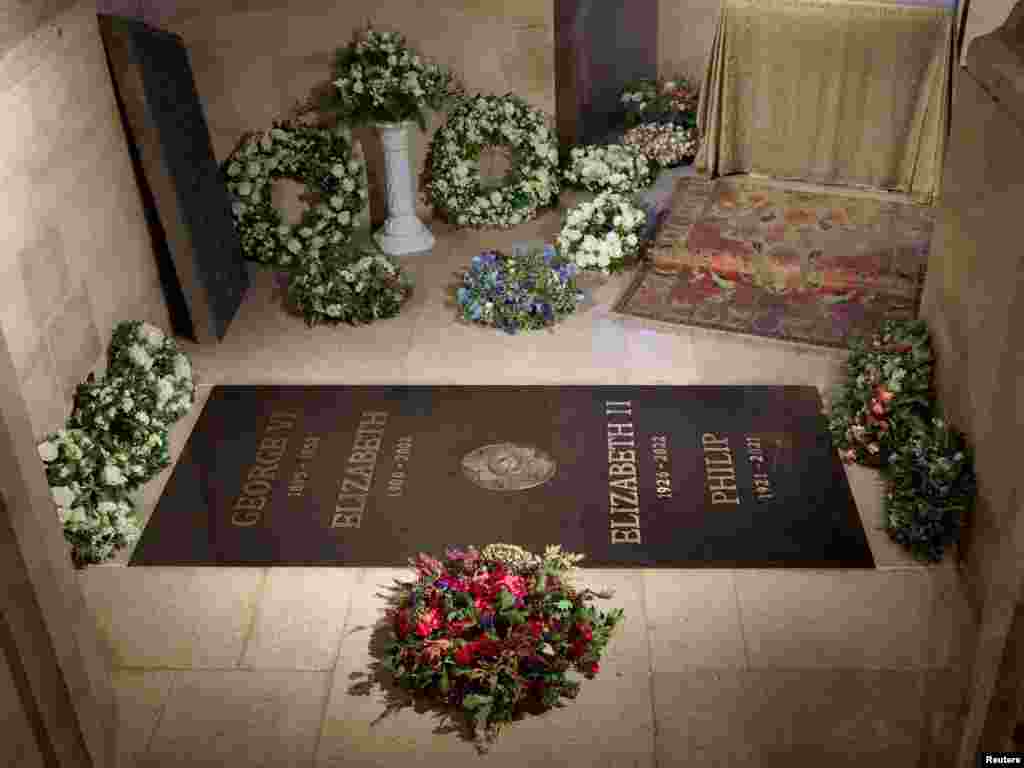 Handout photo from Buckingham Palace, Sept. 24, 2022, shows the ledger stone at the King George VI Memorial Chapel, St George&#39;s Chapel, Windsor Castle. An inscribed stone slab marking the death of Queen Elizabeth II has been laid in the Windsor Castle chapel where her coffin was interred, Buckingham Palace said.