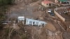 Sebuah rumah tertimbun lumpur setelah tersapu oleh Badai Fiona di Villa Esperanza di Salinas, Puerto Rico, Rabu, 21 September 2022.
