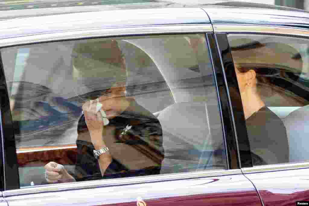 Sophie, Countess of Wessex and Forfar, wipes away her tears as she is driven away from the Queen's funeral service this afternoon in London, Sept. 19, 2022. 