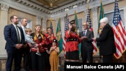 Secretary of the Treasury Janet Yellen swears-in Lynn Malerba, as the Treasurer of the United States at the Treasury Department, Monday, Sept. 12, 2022 in Washington, as her family stands by.