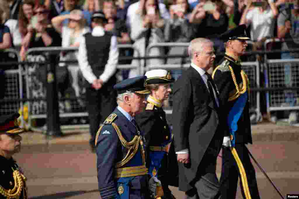 Britain&#39;s King Charles III, Princess Anne, Prince Andrew and Prince Edward follow the coffin of Queen Elizabeth II during a procession from Buckingham Palace to Westminster Hall in London, Sept. 14, 2022.