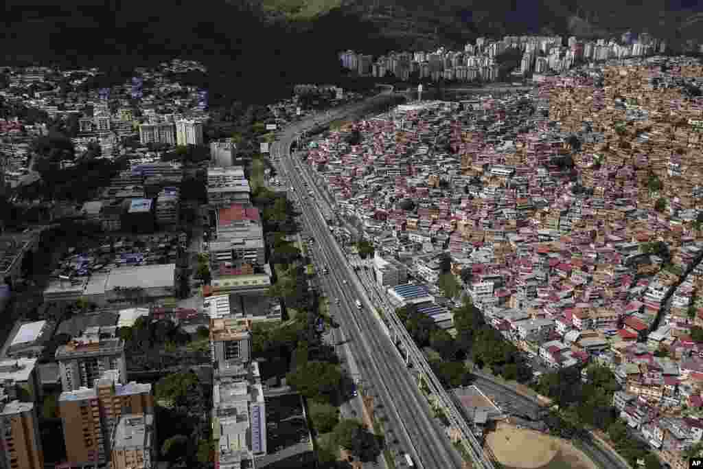 Homes cover a hill in the Petare neighborhood of Caracas, Venezuela, Sept. 24, 2022.