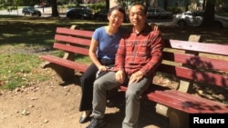 Chinese human rights lawyer Ding Jiaxi and his wife Sophie Luo Shengchun pose for a photo during a visit to Washington in September, 2017.