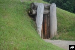 The entrance to the Earth Lodge, where Native Americans held council meetings for 1,000 years until their forced removal in the 1820s, in Macon, Ga., is seen on Aug. 22, 2022.