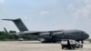 FILE - Pakistan's Foreign Ministry released to media images of a US military aircraft that landed at a military base outside Islamabad on Sept. 9, 2022, bringing relief goods for flood victims.