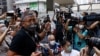 Head of Hong Kong Journalists Group Charged with Obstructing Police 