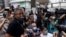 Ronson Chan, chairman of the Hong Kong Journalists Association (HKJA), reports to police over his charge of obstructing police, in Hong Kong, China Sept. 19, 2022. 