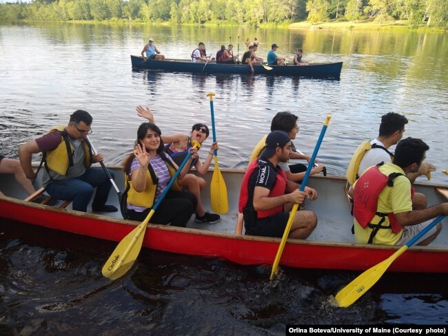 International students on a canoe trip on the Stillwater River near the University of Maine campus in Orono, Maine.