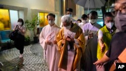 FILE - Catholic Cardinal Joseph Zen, attends a mass at the Holy Cross Church in Hong Kong, May 24, 2022. 