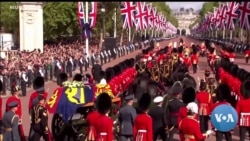 Mourners Line Streets as Queen Elizabeth II Passes on Way to Lie in State
