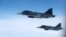 Винищувачі Saab JAS 39 Gripen ВПС Швеції під час навчань, 4 липня 2023. REUTERS/Piroschka van de Wouw