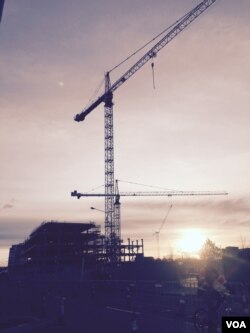 Construction work can be seen across the Christchurch skyline, June 12, 2015. (Phil Mercer for VOA News)