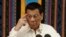 FILE - Philippine President Rodrigo Duterte gestures during his 4th State of the Nation Address at the 18th Congress at the House of Representatives in Quezon city, metropolitan Manila, Philippines, July 22, 2019. 