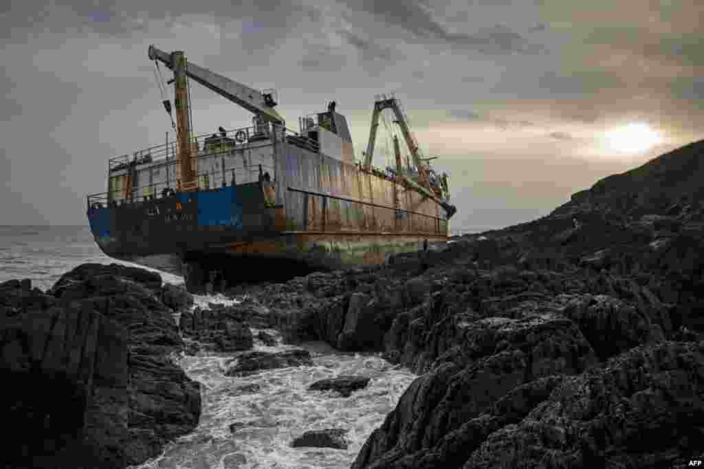 The abandoned 77-meter (250-feet) cargo ship MV Alta is seen stuck on rocks near the village of Ballycotton south-east of Cork in Southern Ireland, Feb. 18, 2020.