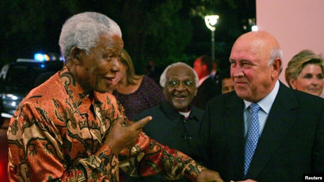 South African Nobel Peace Laureates Nelson Mandela (L) and Archbishop Desmond Tutu (2nd L) arrive for the 70th birthday celebrations of fellow laureate former President FW de Klerk (R) in Cape Town, March 17, 2006. (REUTERS/Mike Hutchings)