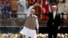 Presiden AS Donald Trump dan Perdana Menteri India Narendra Modi melambaikan tangan ke arah pengunjung di Stadion Sardar Patel, di Ahmedabad, India, 24 Februari 2020. 