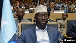 Somalia's President Sheik Sharif Ahmed attends a meeting at the African Union (AU) in Addis Ababa, July 15, 2012. 