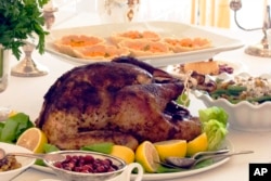 FILE - A Thanksgiving dinner is displayed on a table in Concord, N.H., on Oct. 22, 2012.