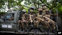 Members of the Kenya Defence Forces (KDF) deployed as part of the East African Community Regional Force (EACRF) ride in a vehicle in Goma, in eastern Congo, Nov. 16, 2022. 