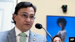 Cherokee Nation Principal Chief Chuck Hoskin Jr. listens during a House Rules Committee hearing on legal and procedural factors related to seating a Cherokee Nation delegate in the U.S. House of Representatives, on Capitol Hill in Washington, Nov. 16, 2022. 