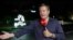 Denmark TV 2 reporter Rasmus Tantholdt's live broadcast from the streets of Doha is interrupted by Qatar security staff, Nov. 15, 2022. (TV 2 Denmark via Reuters)
