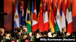 Para delegasi menghadiri acara serah terima Presidensi G20 dari Indonesia ke India di Nusa Dua, Bali, 16 November 2022. (Foto: REUTERS/Willy Kurniawan)