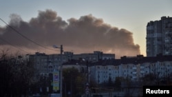 Smoke rises over Lviv, Ukraine, after Russian missile strikes on Nov. 15, 2022.