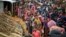 Rohingya Muslims, who from Myanmar into Bangladesh, wait in queues to receive aid at Kutupalong refugee camp in Ukhiya, Bangladesh, Nov. 15, 2017. Secretary of State Rex Tillerson called for an independent investigation into a humanitarian crisis in which hundreds of thousands of Muslim Rohingya have fled to Bangladesh.