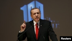 Turkey's President Tayyip Erdogan makes a speech during a Peace Summit ahead of the 100th anniversary of the Battle of Gallipoli, in Istanbul, April 23, 2015.