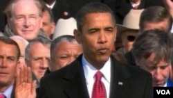 President Obama taking the oath of office at his first inauguration in 2009.