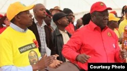 Former Prime Minister and MDC-T leader Morgan Tsvangirai and Mavambo Kusile Dawn party leader Simba Makoni addressing people at Sakubva Stadium, Mutare, Manicaland Province, in the run up to the 2013 general election.