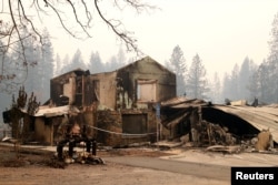 A building destroyed by the Camp Fire is seen in Paradise, California, Nov. 13, 2018.