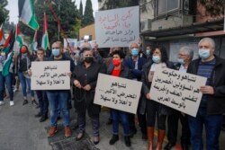 Aksi unjuk rasa warga Israel keturunan Arab saat PM Benjamin Netanyahu meninjau Nazareth, Kota Arab terbesar di Israel, 13 Januari 2021.