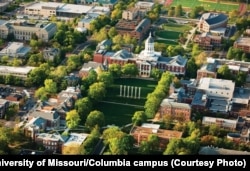 FILE - University of Missouri, Columbia campus, showing Jesse Hall and the Mel Carnahan Quadrangle behind it, and Stankowski Field.