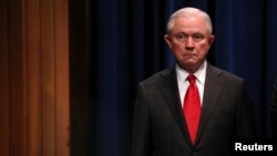 FILE - U.S. Attorney General Jeff Sessions attends a news conference on the arrest of a suspect in the sending of at least a dozen parcel bombs to Democratic politicians and high-profile critics of President Trump.