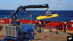 FILE - The United States said last weekend that it would only contribute its sophisticated Bluefin-21 underwater drone for one more month in the search for missing Malaysia Airlines flight MH370.