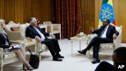 U.S. Secretary of State Rex Tillerson, flanked by his chief of staff Margaret Peterlin (L), meets with Ethiopia Prime Minister Hailemariam Desalegn in Addis Ababa, Ethiopia, March 8, 2018.