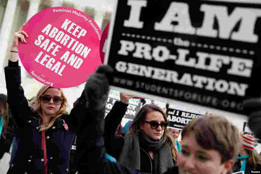 Pro-life and pro-choice activists gather at the Supreme Court for the National March for Life rally in Washington, D.C., Jan. 27, 2017.