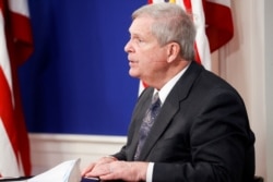 U.S. Secretary of Agriculture Tom Vilsack speaks during a video conference on the White House campus in Washington, Jan. 3, 2022.