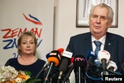 Czech President Milos Zeman, with his wife Ivana, attends a news conference, after polling stations closed for the country's presidential election, in Prague, Czech Republic, Jan. 13, 2018.