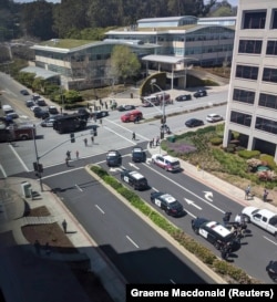 Officials are seen following a possible shooting at the headquarters of YouTube, in San Bruno, California, April 3, 2018 in this picture obtained from social media.