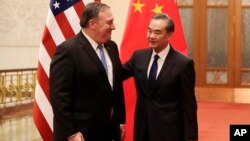 Госсекретарь США Майк Помпео и министр иностранных дел Китая Ван И. Пекин, Китай. 14 июня 2018 г.