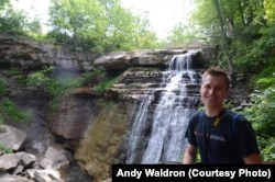 Mikah cools off by a waterfall in Cuyahoga Valley National Park, Ohio.