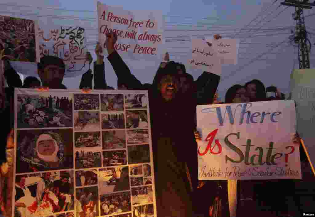 Members of the Hazara community and various non-governmental organizations sit-in during a protest against the twin bomb attack in Quetta, in Lahore, Pakistan, January 12, 2013. 